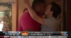 After being picked in the seventh round of the 2014 NFL Draft, 2013 Southeastern Conference Player of the Year, Michael Sam shares a kiss with his lover, Vito Commisano on camera. The video caused a social firestorm.